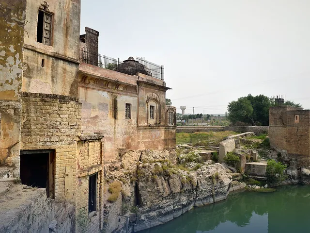 The ancient Katas Raj Temples surrounded by greenery in Chakwal district