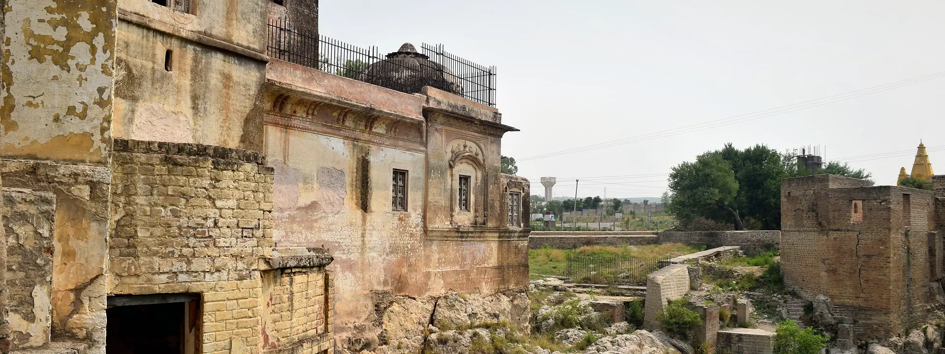 The ancient Katas Raj Temples surrounded by greenery in Chakwal district