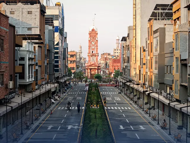 Busy streets and buildings around the Clock Tower in Faisalabad