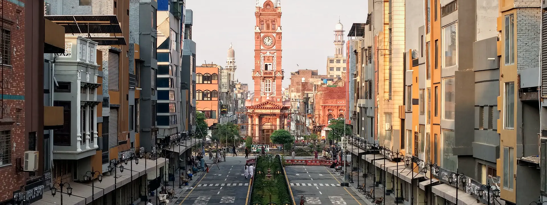 Busy streets and buildings around the Clock Tower in Faisalabad