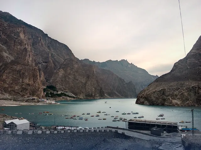 The turquoise water of Attabad Lake surrounded by mountains in Hunza