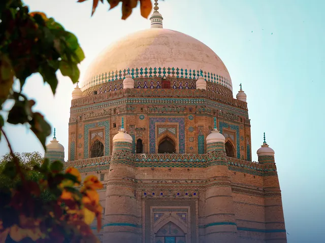 A historic shrine in Multan with its tiled dome and brick walls