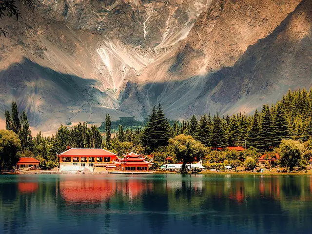 A calm lake beneath the mountains of Skardu