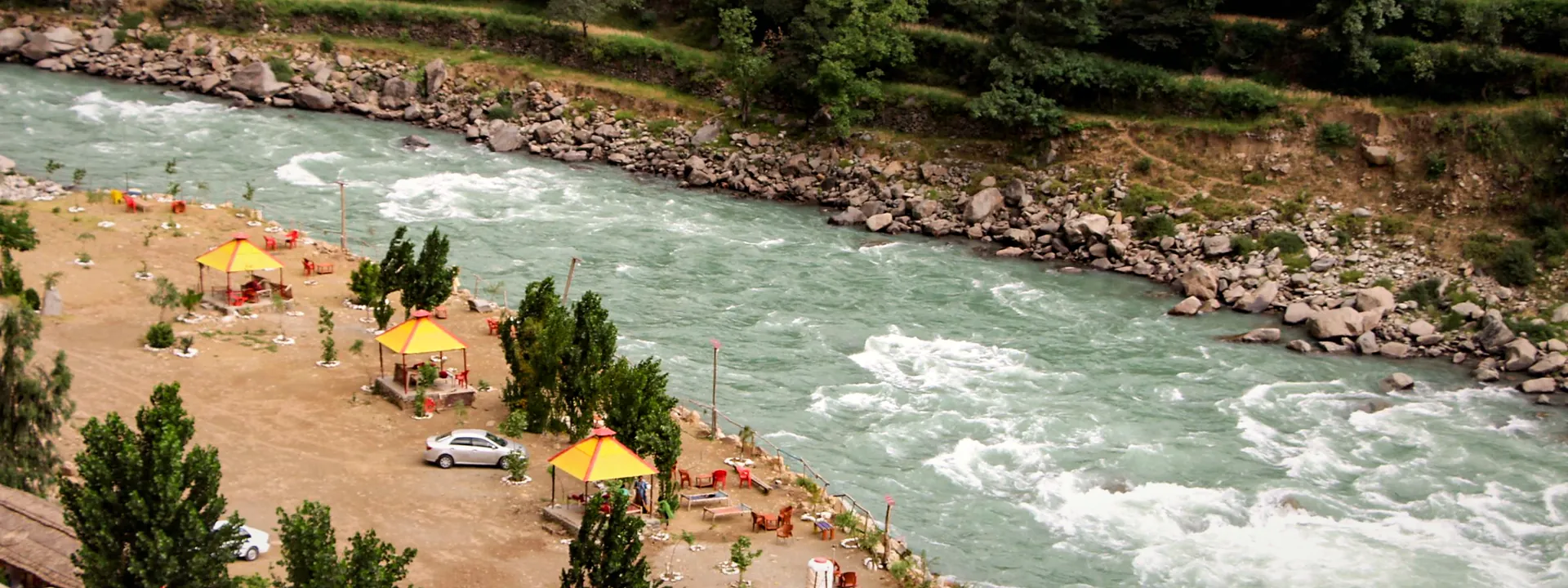 Riverside huts along the Swat River in Madyan, Khyber Pakhtunkhwa