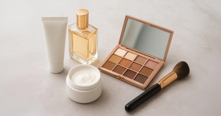 A flat lay of essential beauty products including skincare, makeup, and self-care items, representing must-have beauty products for women.